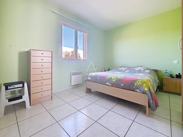 Maison T5 avec garage et jardin