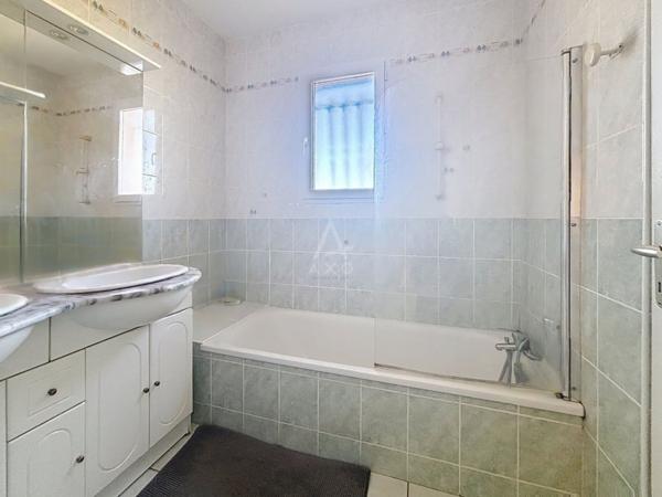 Maison T5 avec garage et jardin