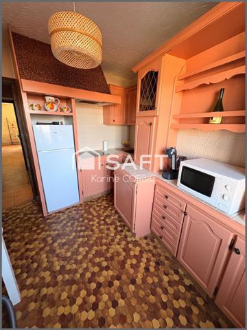 Immeuble en centre bourg de SAINT JULIEN , avec 2 LOGEMENTS, possibilité bureau ou profession liberale