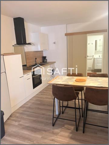 Immeuble en centre bourg de SAINT JULIEN , avec 2 LOGEMENTS, possibilité bureau ou profession liberale