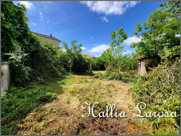 Ensemble immobilier avec garage et jardin