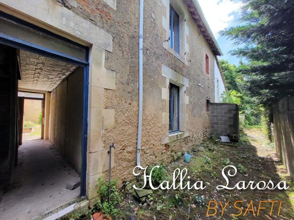 Ensemble immobilier avec garage et jardin