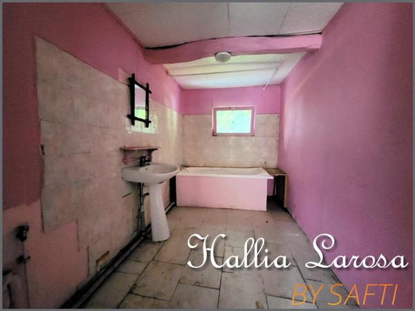 Ensemble immobilier avec garage et jardin