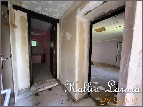 Ensemble immobilier avec garage et jardin