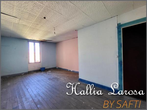 Ensemble immobilier avec garage et jardin