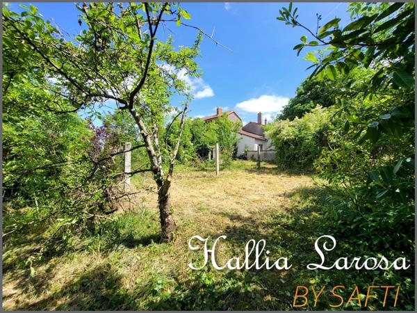 Ensemble immobilier avec garage et jardin