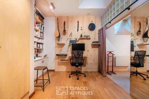Ancien atelier revisité en habitation, au coeur d’une cour végétalisée