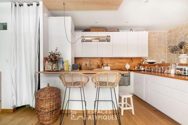 Ancien atelier revisité en habitation, au coeur d’une cour végétalisée