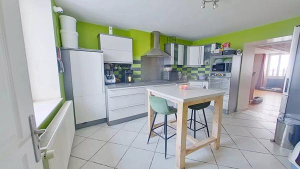 Immeuble composé de 6 appartements