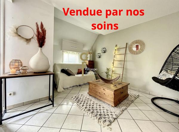 A vendre maison louée avec 3 chambres, un garage et une place de parking