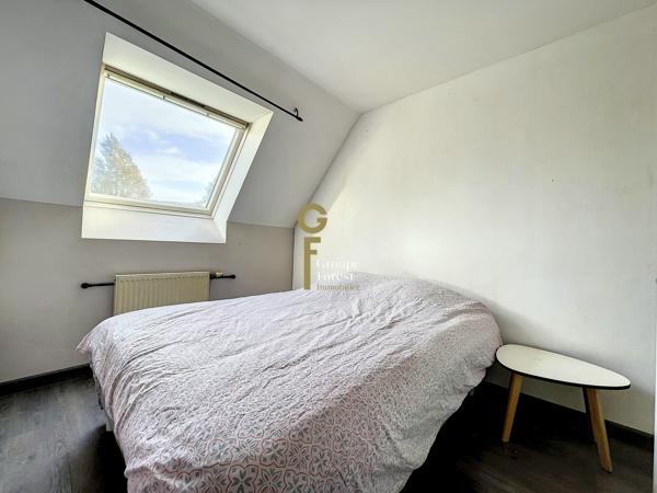 A vendre maison louée avec 3 chambres, un garage et une place de parking