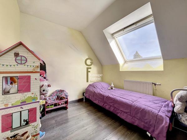 A vendre maison louée avec 3 chambres, un garage et une place de parking