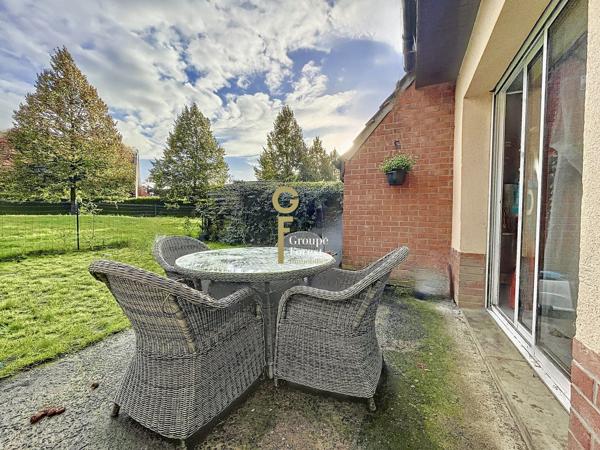 A vendre maison louée avec 3 chambres, un garage et une place de parking