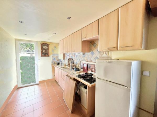 MAISON TRADITIONNELLE 2 LOGEMENTS ET DOUBLE GARAGE