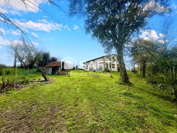 MAISON TRADITIONNELLE 2 LOGEMENTS ET DOUBLE GARAGE