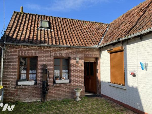 A vendre à AUCHY LES HESDIN, maison avec entrée, salle-salon, trois chambres, garage, jardin