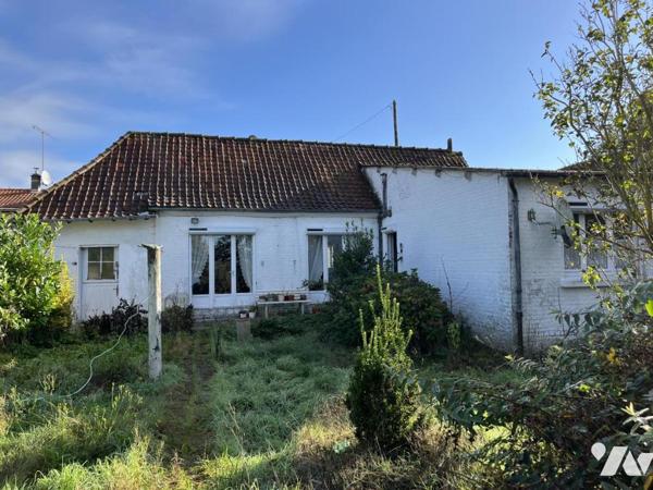 A vendre à AUCHY LES HESDIN, maison avec entrée, salle-salon, trois chambres, garage, jardin