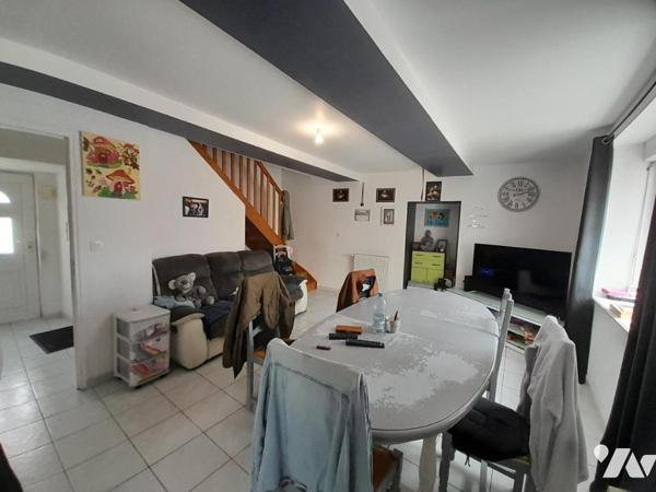 Ensemble immobilier - deux appartements loués.