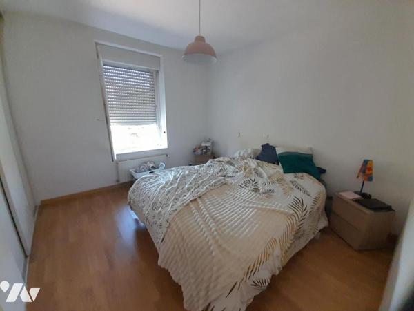 Ensemble immobilier - deux appartements loués.