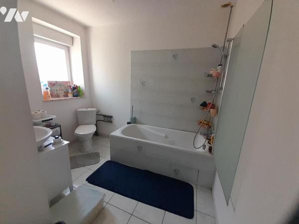 Ensemble immobilier - deux appartements loués.