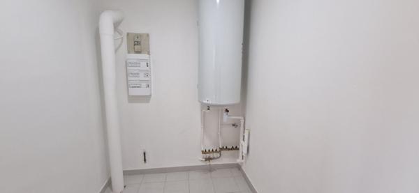 BEL APPARTEMENT AVEC GRAND GARAGE