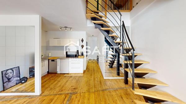 APPARTEMENT ATYPIQUE POUTRE ET PIERRE APPARENTE TYPE 2