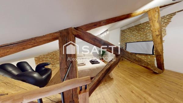 APPARTEMENT ATYPIQUE POUTRE ET PIERRE APPARENTE TYPE 2