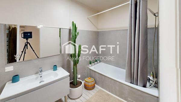 APPARTEMENT ATYPIQUE POUTRE ET PIERRE APPARENTE TYPE 2