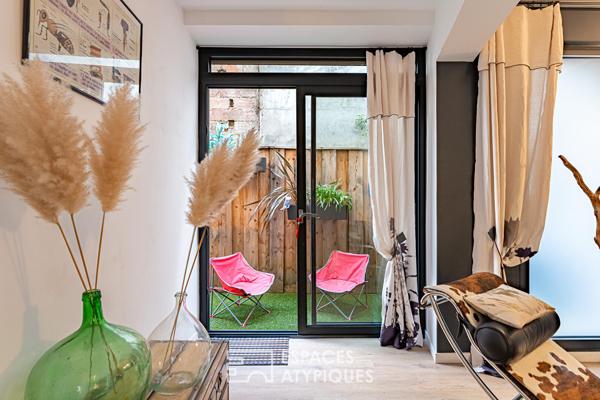Loft en triplex avec terrasse et courette