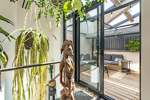 Loft en triplex avec terrasse et courette