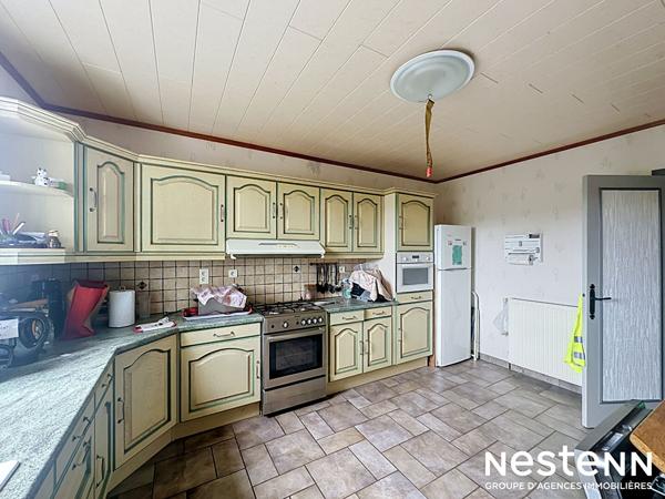 A vendre Maison Mirande 141 m2 avec terrain arboré et cloturé et garage et piscine