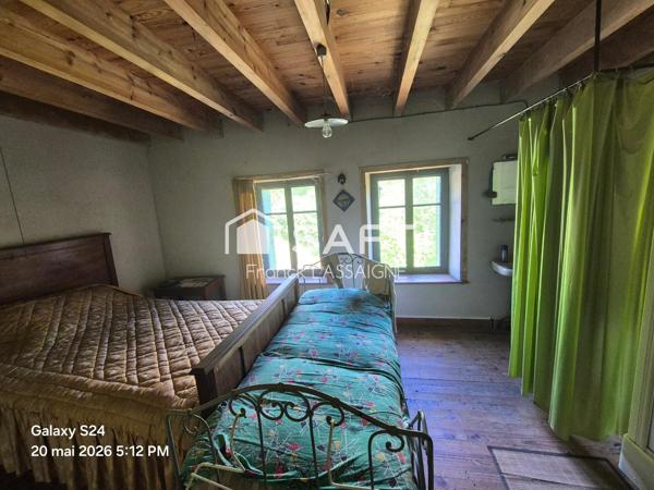 Maison à rénover avec beau potentiel