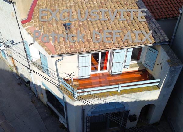 Grande maison à multiples possibilités.