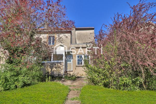 Maison mitoyenne de 117 m² avec jardin.