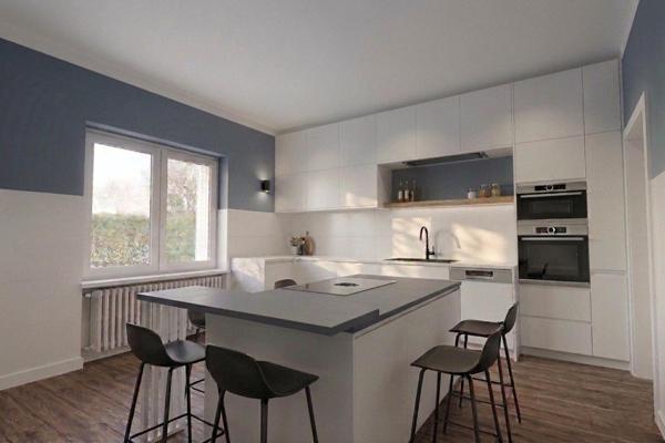 Maison mitoyenne de 117 m² avec jardin.