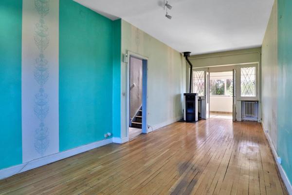 Maison mitoyenne de 117 m² avec jardin.