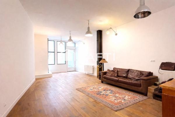 Loft d’exception avec jardin sans vis-à-vis et volumes rares
