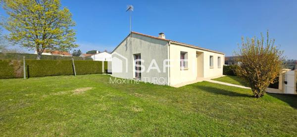 Pavillon plain-pied 96m², 3 chambres, 574m² de terrain + garage.