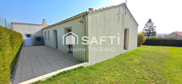 Pavillon plain-pied 96m², 3 chambres, 574m² de terrain + garage.