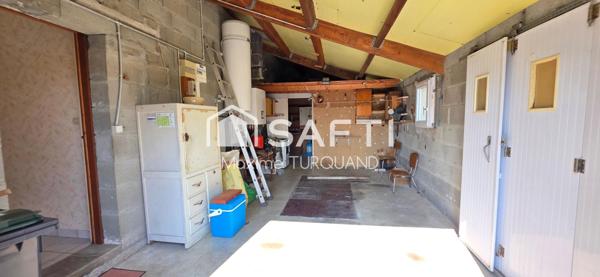 Pavillon plain-pied 96m², 3 chambres, 574m² de terrain + garage.