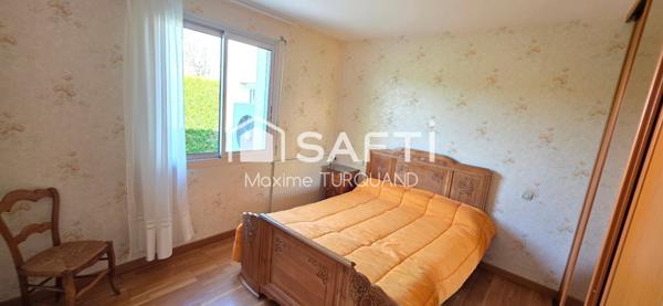 Pavillon plain-pied 96m², 3 chambres, 574m² de terrain + garage.