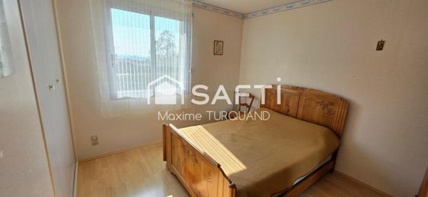 Pavillon plain-pied 96m², 3 chambres, 574m² de terrain + garage.