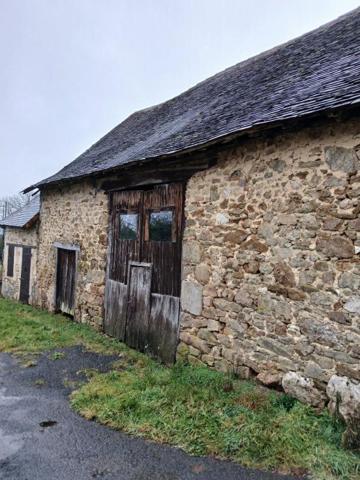 Maison, granges et 15 hectares de terres agricoles