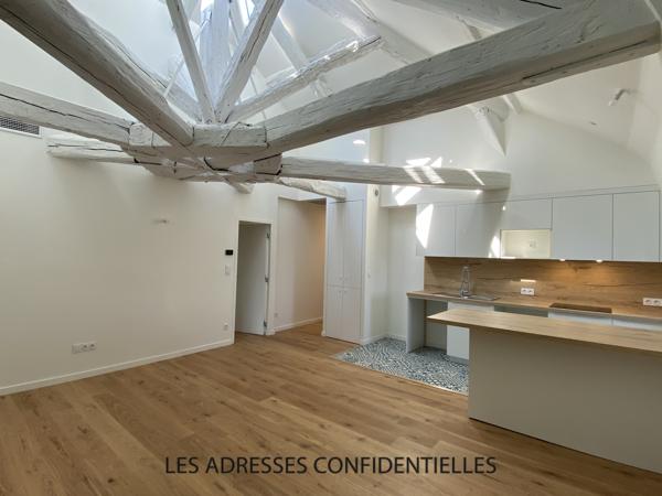 CHARBONNIERE - Appartement T4 de charme avec parkings - 79.20m² - 1600 € hors charges.