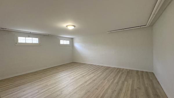 Maison familiale avec garage et jardin