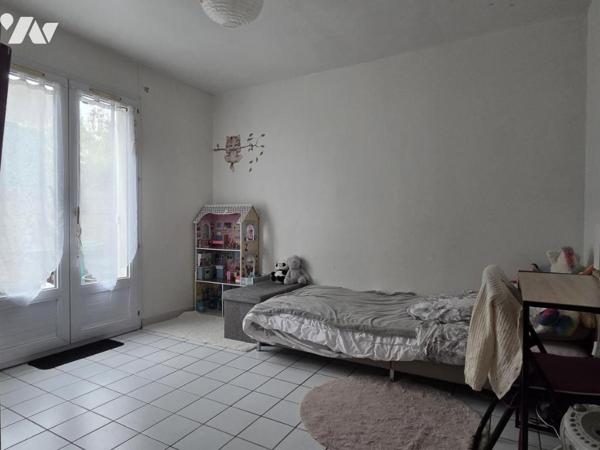 Maison de ville - quatre chambres - 100 m² habitables