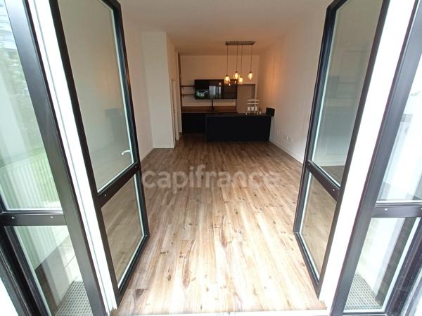 T4 neuf 84 m² 3 chambres salle de bain + salle d'eau terrasse + jardin + 2 parkings en sous-sol
