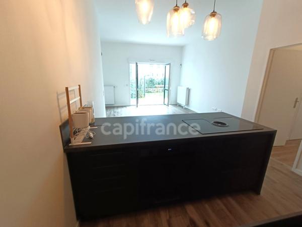 T4 neuf 84 m² 3 chambres salle de bain + salle d'eau terrasse + jardin + 2 parkings en sous-sol