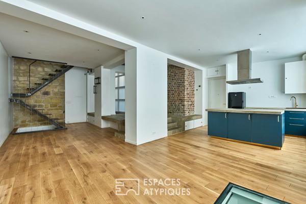 Ancien studio photo transformé en triplex à Marcadet – Poissonniers