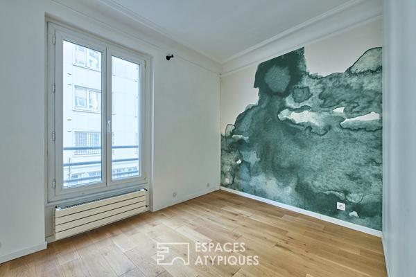 Ancien studio photo transformé en triplex à Marcadet – Poissonniers